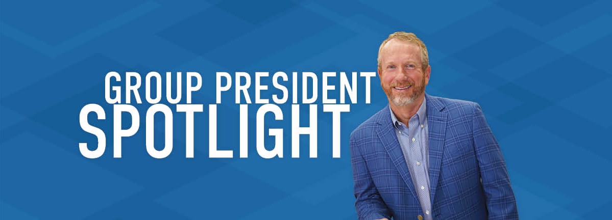 Picture of President Brian Seay in blue suit with no tie